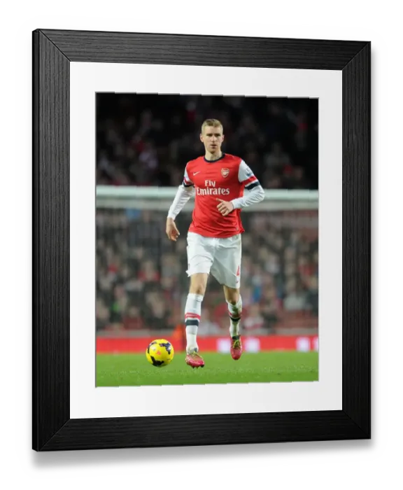Framed Print : Per Mertesacker (Arsenal). Arsenal 2: 0 Crystal Palace. Barclays Premier League. Emirates Stadium
