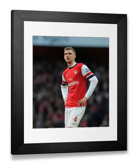 Framed Print : Per Mertesacker Focuses in Arsenal vs Crystal Palace Premier League Clash