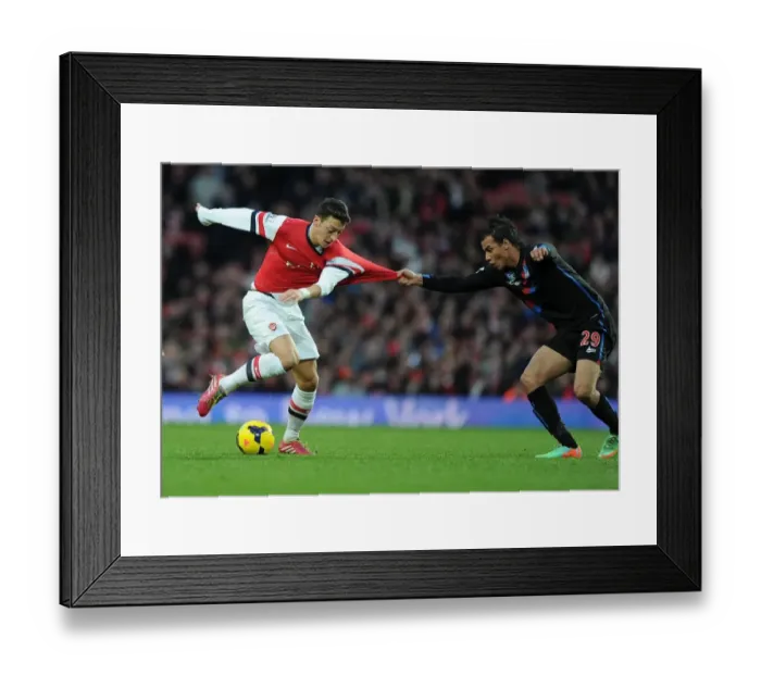 Framed Print : Mesut Ozil vs Marouane Chamakh: Intense Battle at Arsenal vs Crystal Palace, Premier League 2013-14