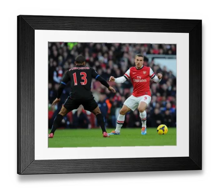 Framed Print : Arsenal's Lukas Podolski Tangles with Crystal Palace's Jason Puncheon in Premier League Clash