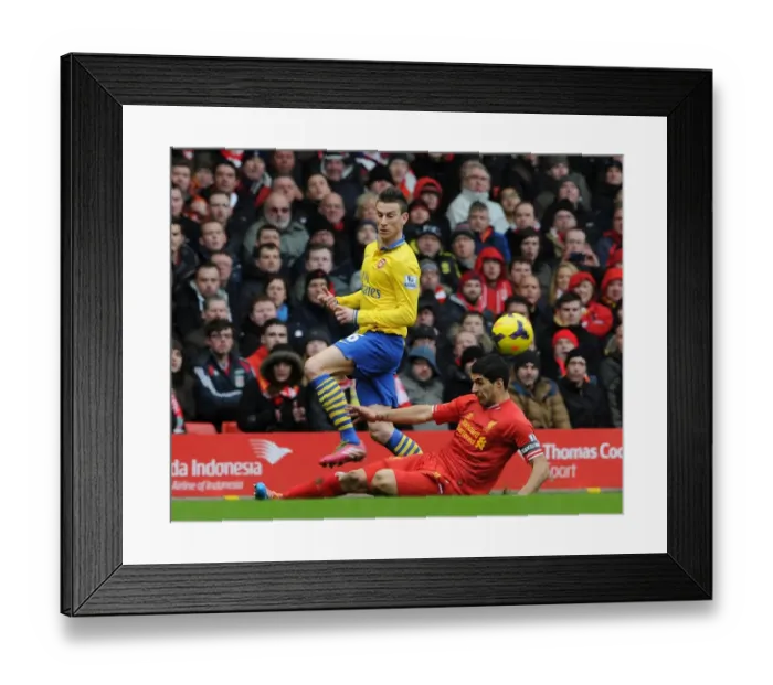 Framed Print : Koscielny vs Suarez: Intense Battle at Anfield (Liverpool v Arsenal, 2013-14) Framed Print : Koscielny vs Suarez: Intense Battle at Anfield (Liverpool v Arsenal, 2013-14)