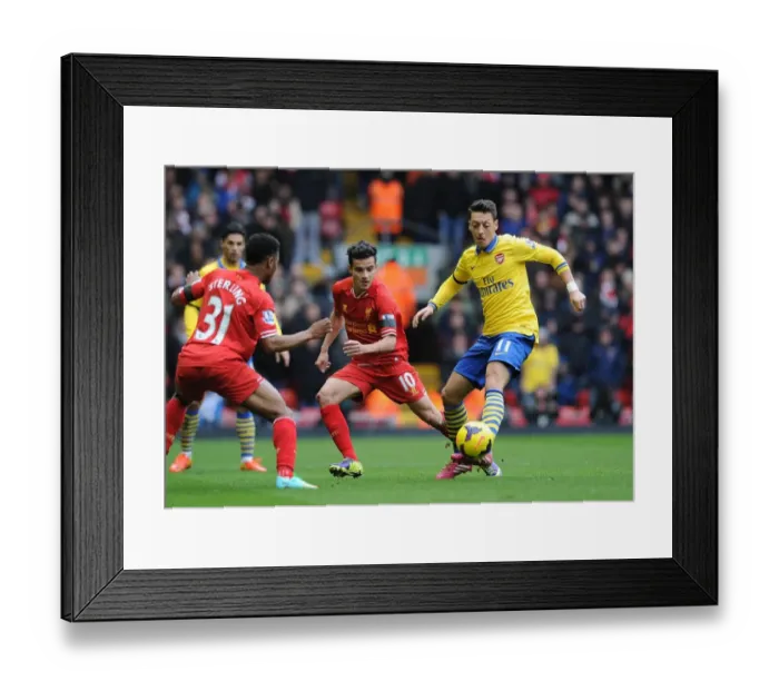 Framed Print : Mesut Ozil vs Raheem Sterling and Philippe Coutinho: Liverpool vs Arsenal, Premier League 2013-14 Framed Print : Mesut Ozil vs Raheem Sterling and Philippe Coutinho: Liverpool vs Arsenal, Premier League 2013-14