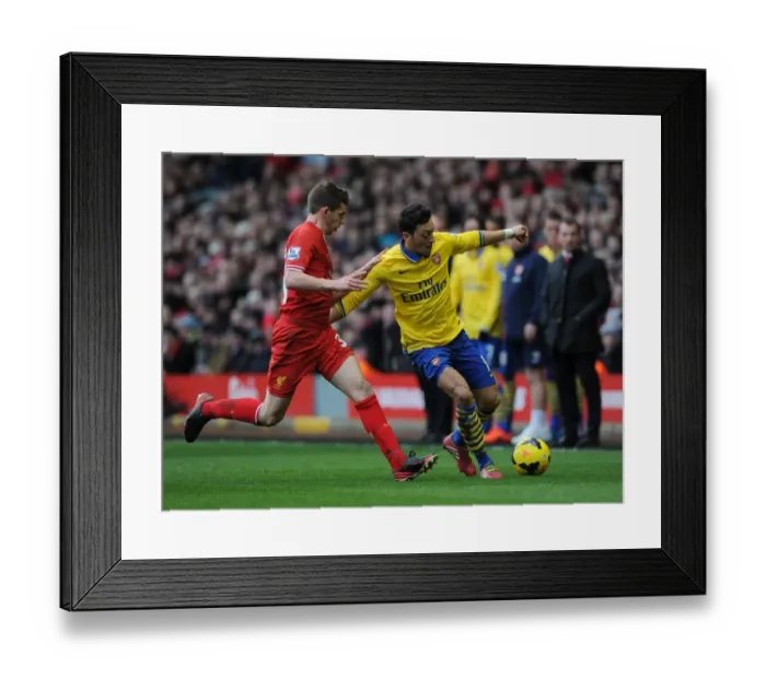 Framed Print : Mesut Ozil vs Jon Flanagan: Intense Battle at Anfield (Liverpool v Arsenal, 2013-14) Framed Print : Mesut Ozil vs Jon Flanagan: Intense Battle at Anfield (Liverpool v Arsenal, 2013-14)
