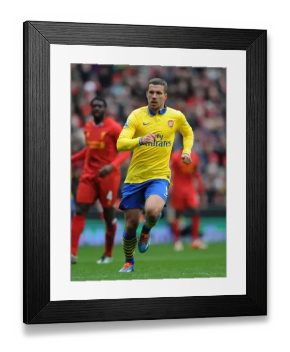 Framed Print : Lukas Podolski in Action: Liverpool vs Arsenal, Premier League 2013-14