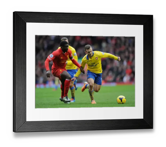 Framed Print : Wilshere's Determined Stride: Outpacing Rival Kolo Toure in the Liverpool vs. Arsenal Premier League Clash Framed Print : Wilshere's Determined Stride: Outpacing Rival Kolo Toure in the Liverpool vs. Arsenal Premier League Clash