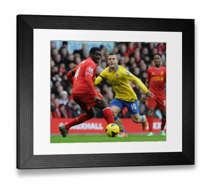 Framed Print : Jack Wilshere vs. Kolo Toure: Intense Rivalry at Anfield (Liverpool v Arsenal, 2013-14) Framed Print : Jack Wilshere vs. Kolo Toure: Intense Rivalry at Anfield (Liverpool v Arsenal, 2013-14)