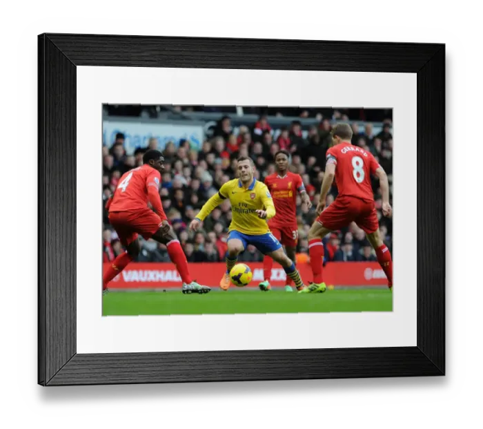Framed Print : Jack Wilshere Charges Past Kolo Toure and Steven Gerrard in Intense Liverpool vs. Arsenal Clash Framed Print : Jack Wilshere Charges Past Kolo Toure and Steven Gerrard in Intense Liverpool vs. Arsenal Clash