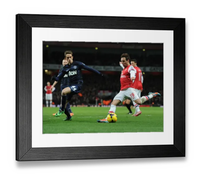 Framed Print : Arsenal vs Manchester United: Santi Cazorla vs Adnan Januzaj Clash in the Premier League