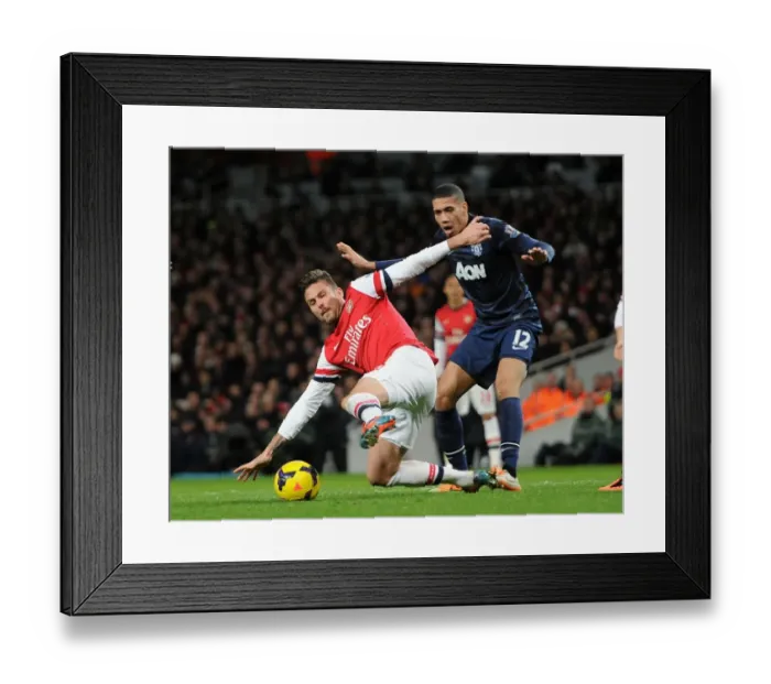Framed Print : Clash at the Emirates: Giroud vs Smalling - Arsenal vs Manchester United, Premier League 2013-14