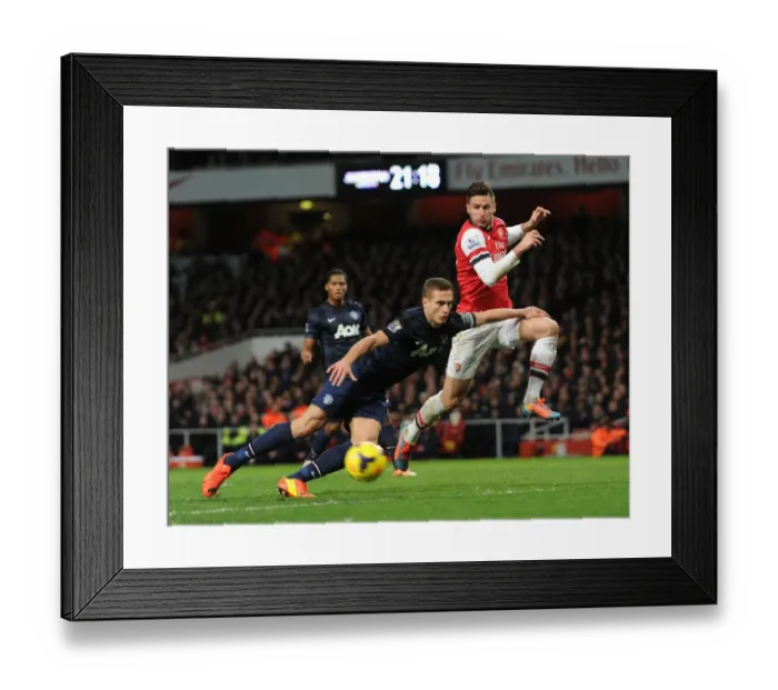 Framed Print : Clash of Titans: Giroud vs. Vidic - A Battle for Supremacy: Arsenal vs. Manchester United, Premier League, 2014