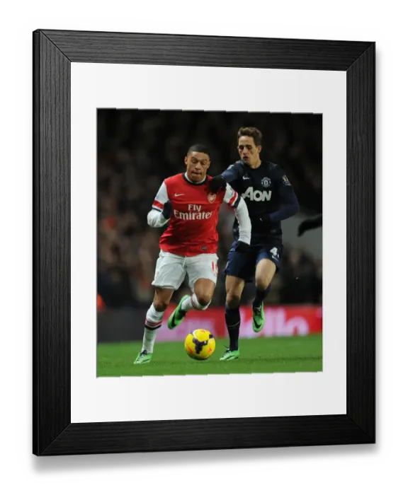 Framed Print : Arsenal vs Manchester United: Oxlade-Chamberlain vs Januzaj Clash in Premier League