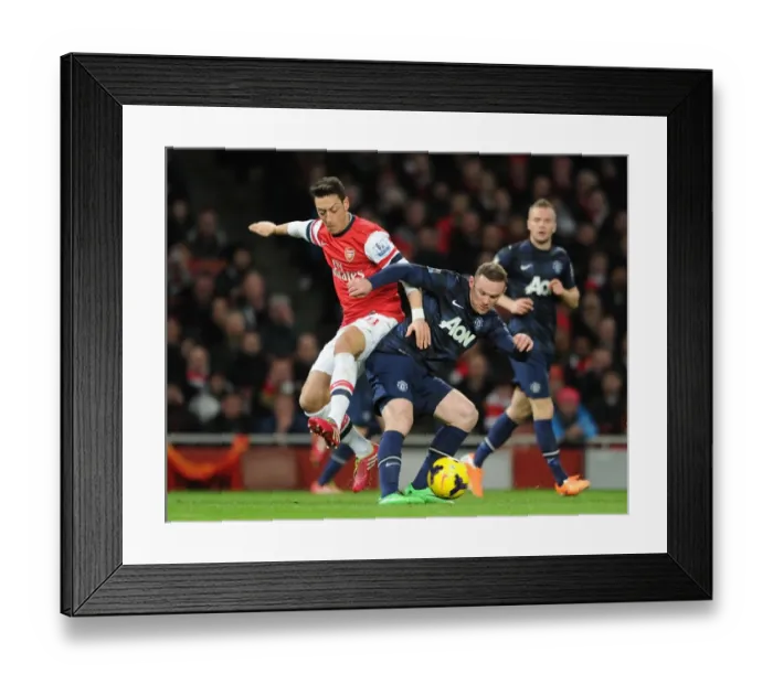 Framed Print : Mesut Ozil (Arsenal) Watne Rooney (Man Utd). Arsenal 0: 0 Manchester United. Barclays Premier League