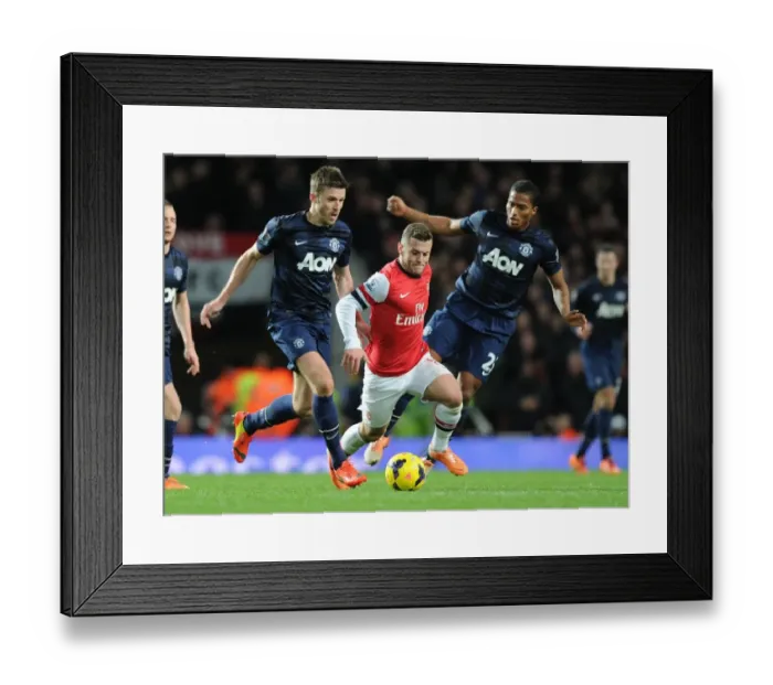 Framed Print : Jack Wilshere's Agile Outmaneuver: Arsenal Star Outwits Michael Carrick and Antonio Valencia (2013-14) Framed Print : Jack Wilshere's Agile Outmaneuver: Arsenal Star Outwits Michael Carrick and Antonio Valencia (2013-14)