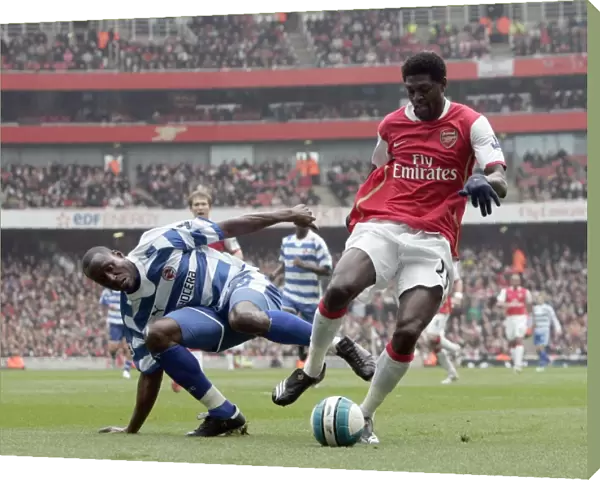 Emmanuel Adebayor (Arsenal) Ibrahima Sonko (Reading)
