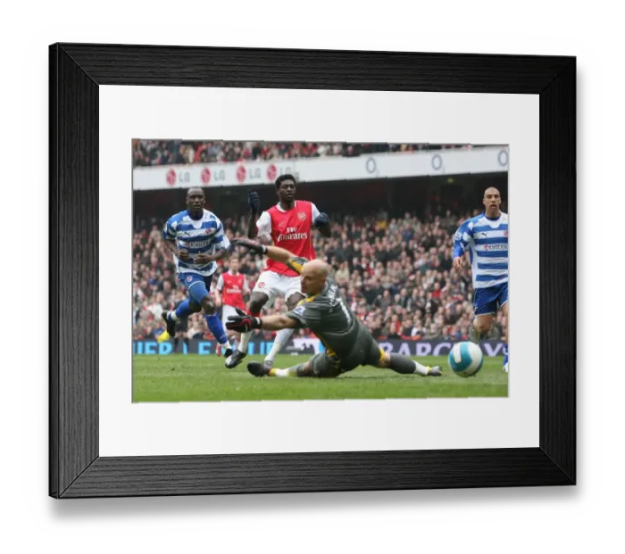 Framed Print : Emmanuel Adebayor shoots past Reading goalkeeper Marcus Hahnemann to score the 1st Arsenal goal Framed Print : Emmanuel Adebayor shoots past Reading goalkeeper Marcus Hahnemann to score the 1st Arsenal goal