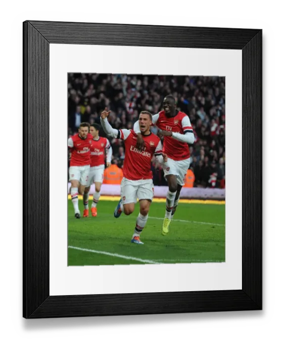 Framed Print : Arsenal's Podolski and Sanogo Celebrate Goals Against Liverpool in FA Cup Fifth Round Framed Print : Arsenal's Podolski and Sanogo Celebrate Goals Against Liverpool in FA Cup Fifth Round