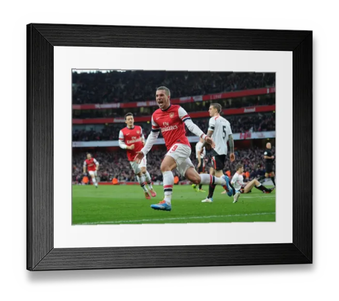 Framed Print : Lukas Podolski's FA Cup Goal Celebration: Arsenal's Second against Liverpool (2013-14)