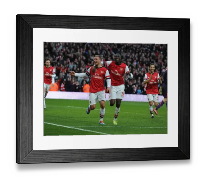 Framed Print : Podolski and Sanogo's Unforgettable Goal Celebration: Arsenal's FA Cup Victory Over Liverpool