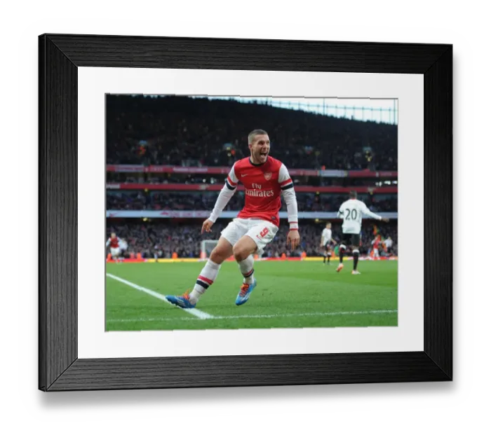 Framed Print : Lukas Podolski Scores Thrilling FA Cup Goal Against Liverpool at Emirates Stadium Framed Print : Lukas Podolski Scores Thrilling FA Cup Goal Against Liverpool at Emirates Stadium