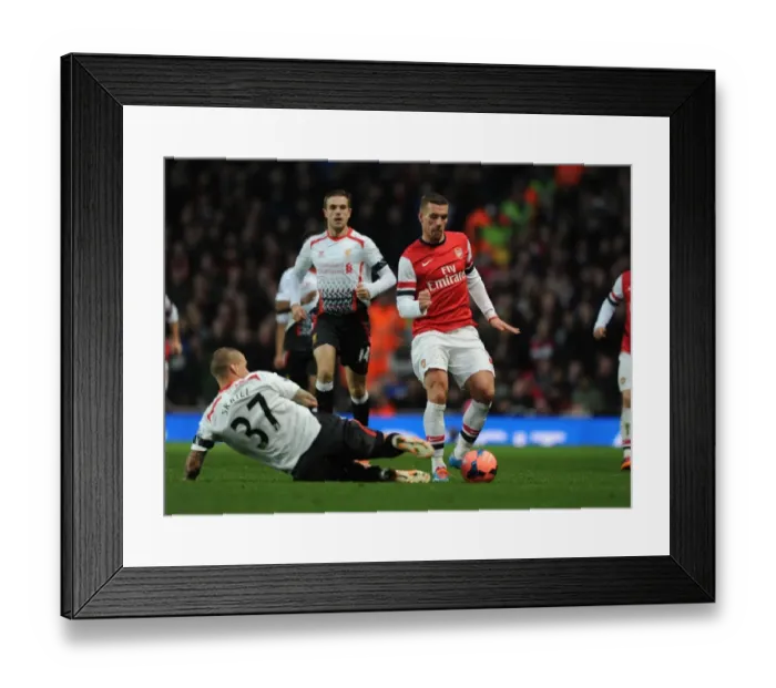 Framed Print : Clash of Titans: Lukas Podolski vs. Martin Skrtel - Arsenal v Liverpool, FA Cup 2013-14 Framed Print : Clash of Titans: Lukas Podolski vs. Martin Skrtel - Arsenal v Liverpool, FA Cup 2013-14