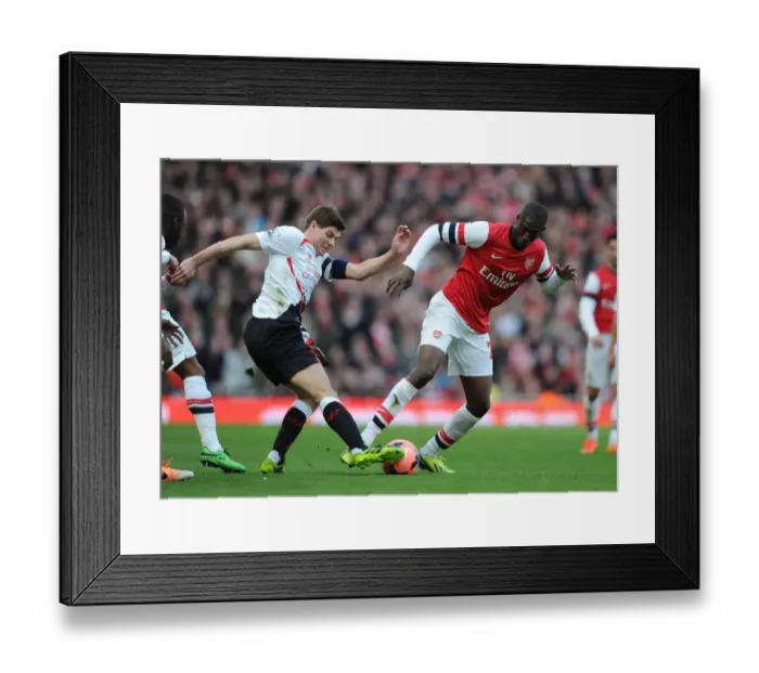 Framed Print : Clash of Titans: Sanogo vs. Gerrard - Arsenal vs. Liverpool, FA Cup 2013-14