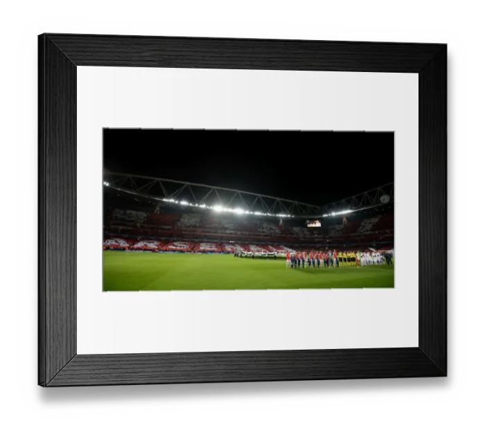 Framed Print : Arsenal vs. Bayern Munich: UEFA Champions League Showdown at Emirates Stadium