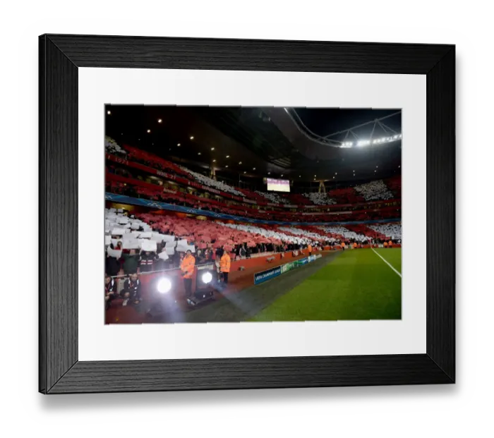Framed Print : Arsenal fans hold up cards before the match. Arsenal 0: 2 Bayern Munich. UEFA Champions League Framed Print : Arsenal fans hold up cards before the match. Arsenal 0: 2 Bayern Munich. UEFA Champions League