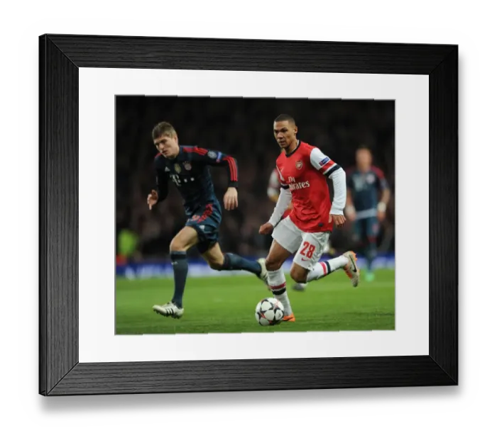 Framed Print : Arsenal vs. Bayern Munich: Kieran Gibbs vs. Toni Kroos in UEFA Champions League Showdown
