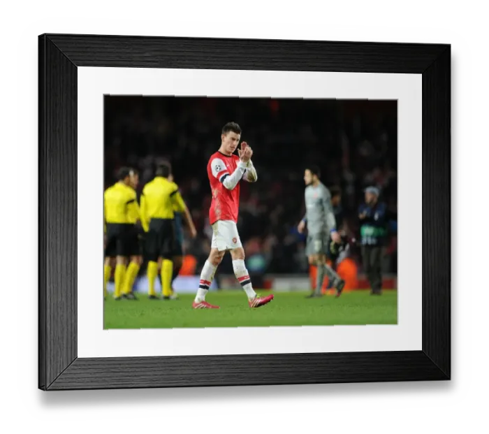 Framed Print : Laurent Koscielny (Arsenal). Arsenal 0: 2 Bayern Munich. UEFA Champions League. Round of 16, 1st Leg Framed Print : Laurent Koscielny (Arsenal). Arsenal 0: 2 Bayern Munich. UEFA Champions League. Round of 16, 1st Leg