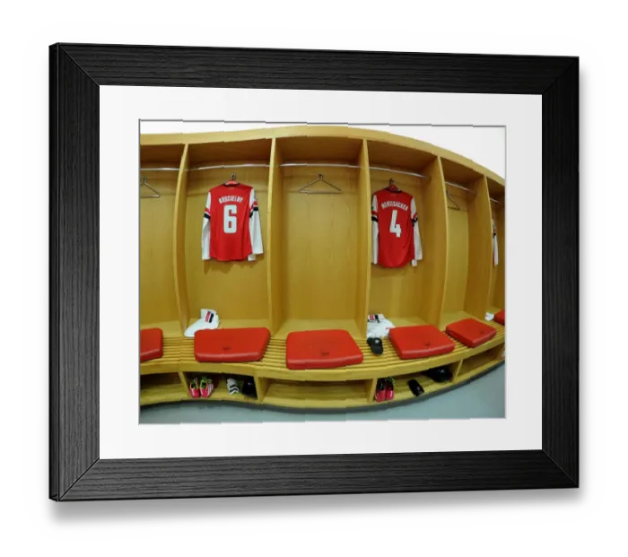 Framed Print : Arsenal's Koscielny and Mertesacker: Preparing for Battle against Bayern Munich in the Champions League