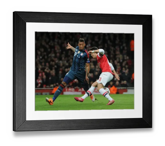 Framed Print : Mesut Ozil vs Jerome Boateng: Penalty Drama in Arsenal vs Bayern Munich UCL Clash
