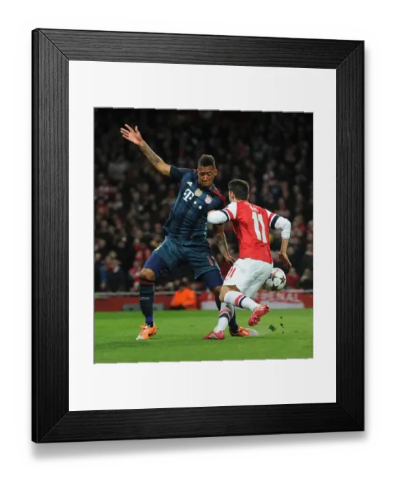 Framed Print : Mesut Ozil vs Jerome Boateng: Penalty Showdown in Arsenal vs Bayern Munich UCL Clash Framed Print : Mesut Ozil vs Jerome Boateng: Penalty Showdown in Arsenal vs Bayern Munich UCL Clash