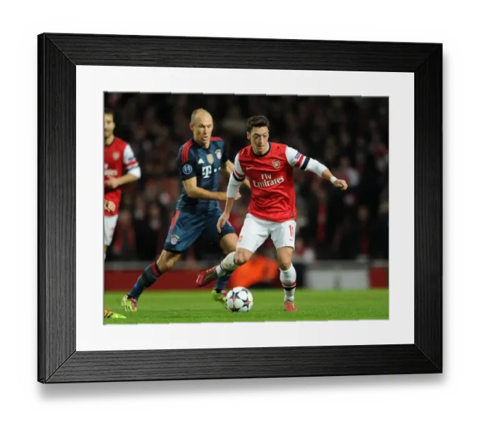 Framed Print : Mesut Ozil (Arsenal) Arjen Robben (Bayern). Arsenal 0: 2 Bayern Munich. UEFA Champions League Framed Print : Mesut Ozil (Arsenal) Arjen Robben (Bayern). Arsenal 0: 2 Bayern Munich. UEFA Champions League