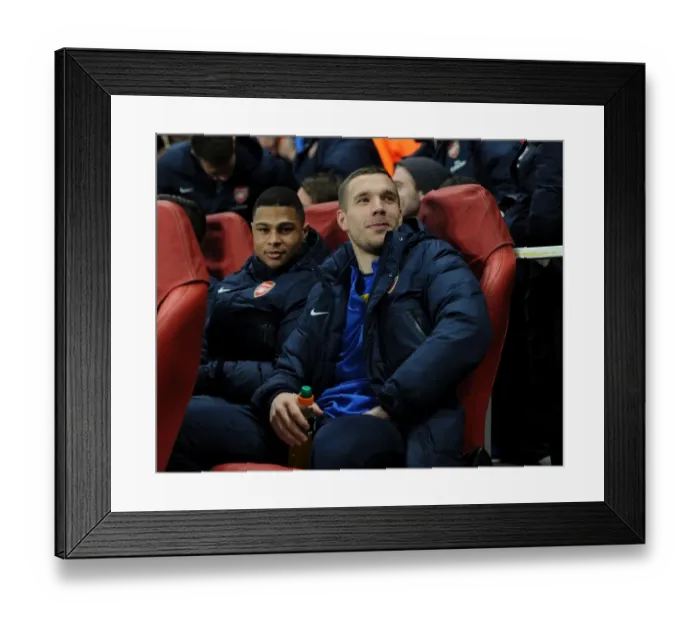 Framed Print : Arsenal FC: Lukas Podolski and Serge Gnabry before the Arsenal v FC Bayern Munchen UEFA Champions League Clash