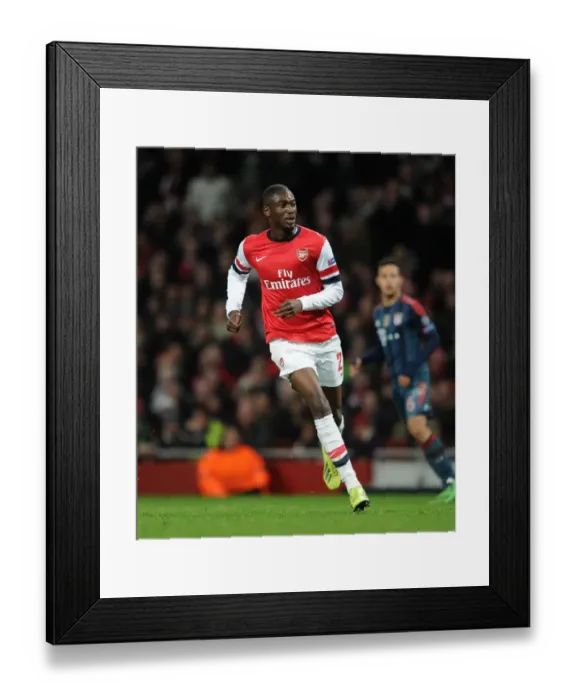Framed Print : Yaya Sanogo (Arsenal). Arsenal 0: 2 Bayern Munich. UEFA Champions League. Round of 16, 1st Leg