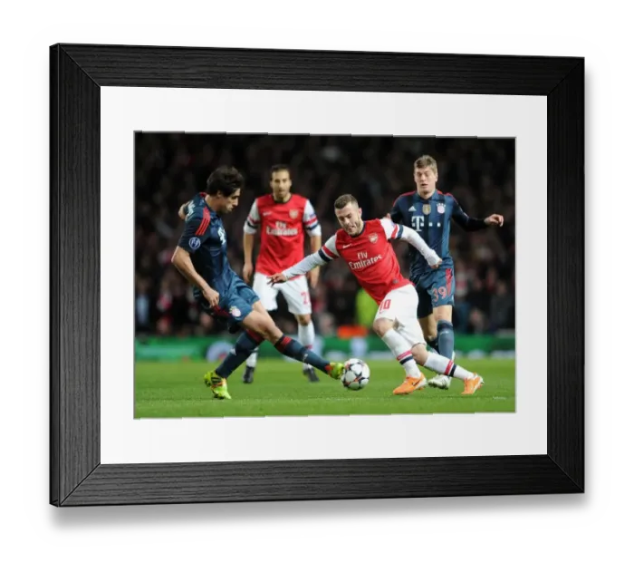 Framed Print : Jack Wilshere vs. Javier Martinez: Battle in the Midfield - Arsenal v FC Bayern Munich, UEFA Champions League 2013-14