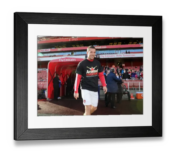 Framed Print : Lukas Podolski (Arsenal) in his Arsenal for Everyone T Shirt. Arsenal 4: 1 Sunderland Framed Print : Lukas Podolski (Arsenal) in his Arsenal for Everyone T Shirt. Arsenal 4: 1 Sunderland