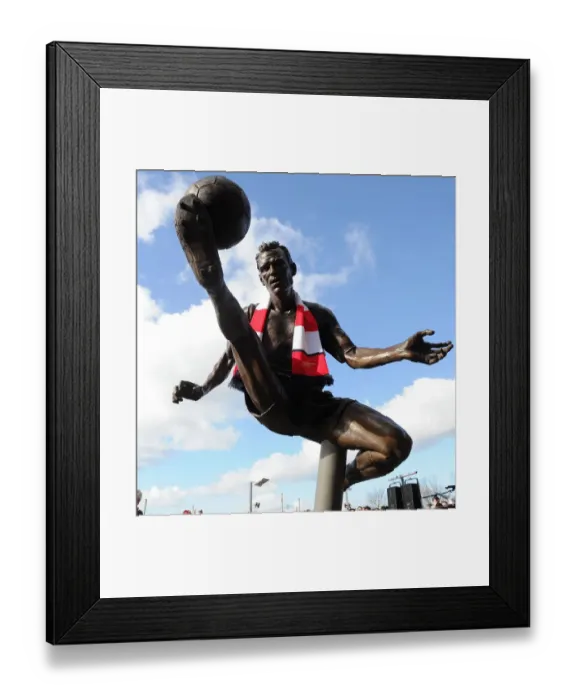 Framed Print : Dennis Bergkamp Statue Unveiled at Arsenal Stadium: Arsenal vs. Sunderland, Premier League 2013-14