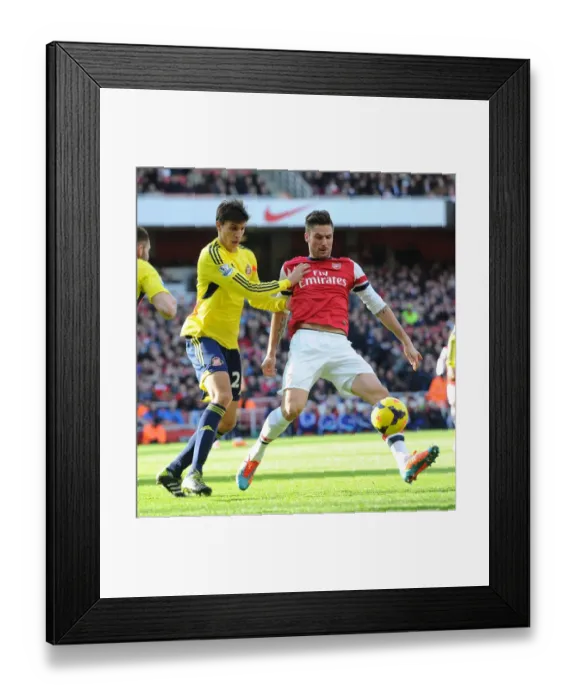 Framed Print : Arsenal's Olivier Giroud Battles Sunderland's Santiago Vergini Framed Print : Arsenal's Olivier Giroud Battles Sunderland's Santiago Vergini