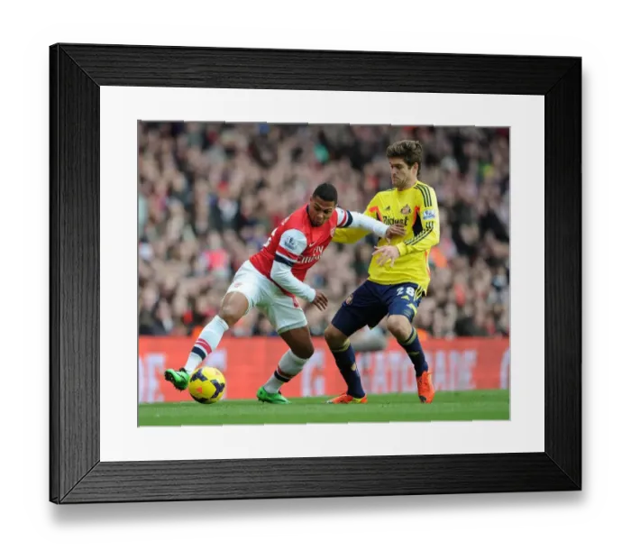 Framed Print : Serge Gnabry vs. Marcos Alonso: Intense Battle at Arsenal v Sunderland, Premier League 2013-14 Framed Print : Serge Gnabry vs. Marcos Alonso: Intense Battle at Arsenal v Sunderland, Premier League 2013-14