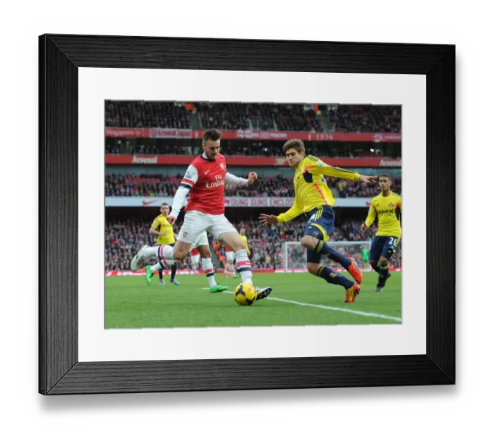Framed Print : Arsenal's Jenkinson Faces Off Against Alonso in Intense Premier League Clash