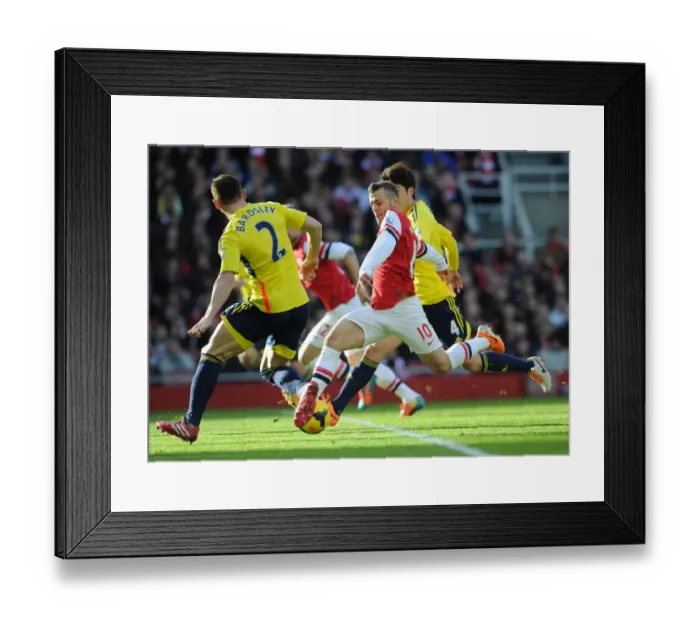 Framed Print : Jack Wilshere (Arsenal) Phil Bardsley (Sunderland). Arsenal 4: 1 Sunderland. Barclays Premier League
