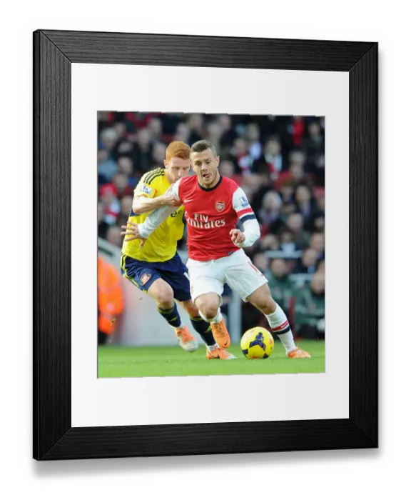 Framed Print : Jack Wilshere's Magic: Outmaneuvering Jack Colback in Arsenal's Premier League Victory (2013-14)