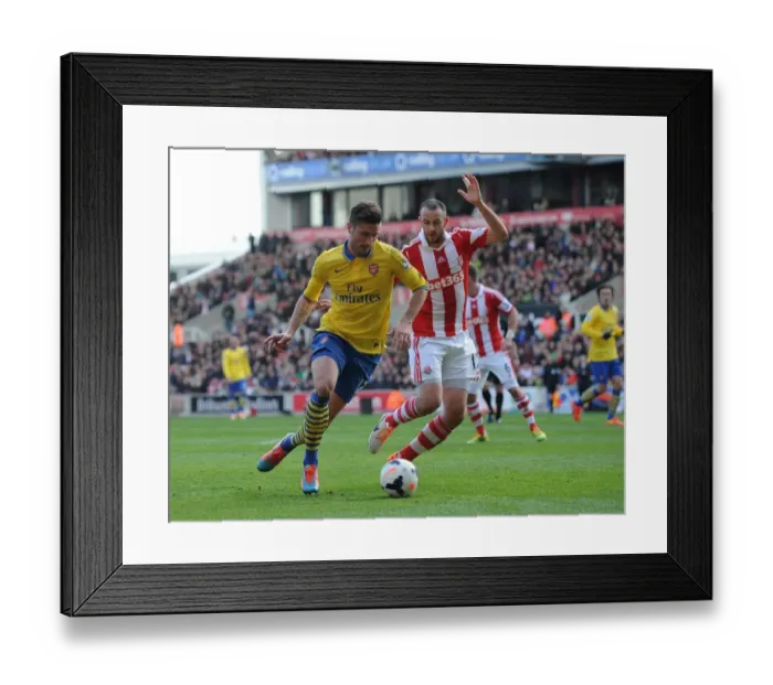 Framed Print : Giroud vs. Wilson: Intense Battle at Britannia Stadium - Stoke City vs. Arsenal, Premier League 2013-14
