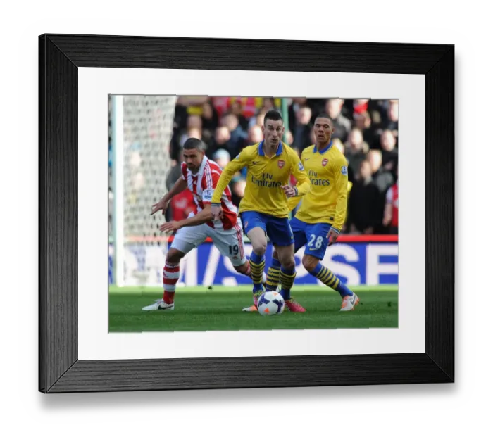 Framed Print : Koscielny Overcomes Walters: Stoke City vs. Arsenal, Premier League 2013-14