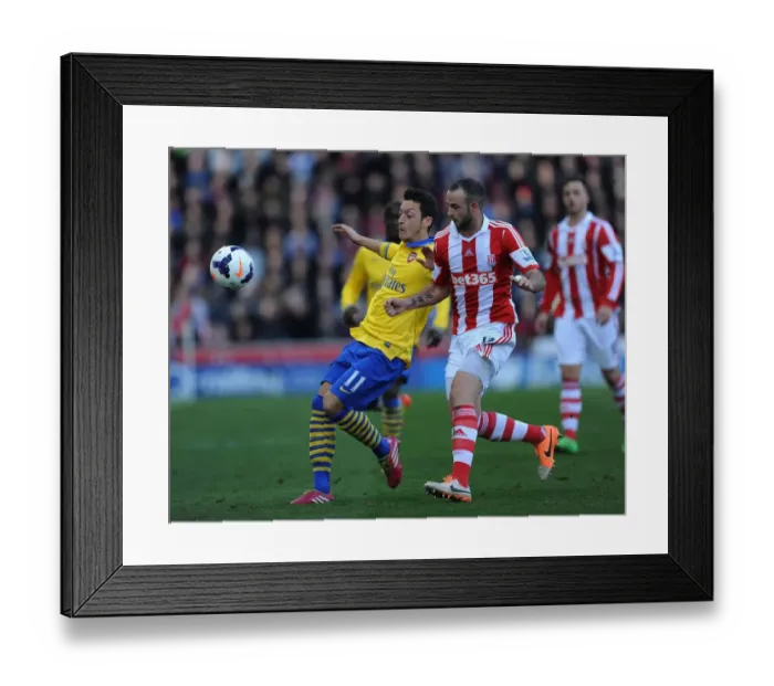 Framed Print : Premier League Showdown: Arsenal vs Stoke City at Britannia Stadium (March 2014)