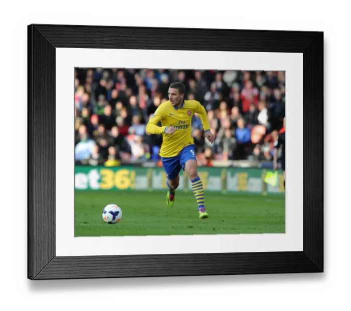 Framed Print : Lukas Podolski in Action: Stoke City vs. Arsenal, Premier League 2013-14 Framed Print : Lukas Podolski in Action: Stoke City vs. Arsenal, Premier League 2013-14