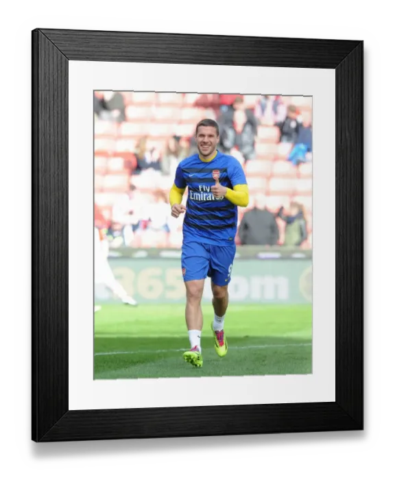 Framed Print : Lukas Podolski (Arsenal). Stoke City 1: 0 Arsenal. Barclays Premier League. The Britainna Stadium