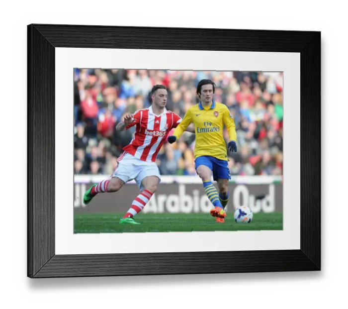 Framed Print : Tomas Rosicky Outmaneuvers Marko Arnautovic: A Pivotal Moment in Stoke vs. Arsenal Premier League Clash
