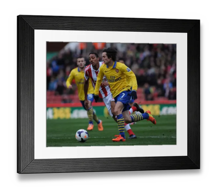 Framed Print : Tomas Rosicky Outmaneuvers Steven Nzonzi: A Moment from the Stoke City vs. Arsenal Premier League Clash (2013-14) Framed Print : Tomas Rosicky Outmaneuvers Steven Nzonzi: A Moment from the Stoke City vs. Arsenal Premier League Clash (2013-14)